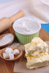 Components of cookies, on color wooden background