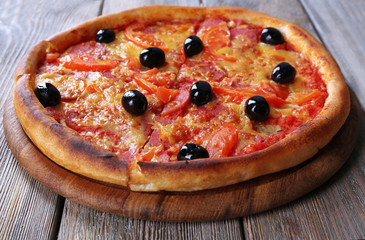 Delicious Italian pizza with black olives