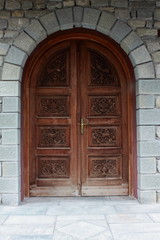 large wooden carved arched Church Doors