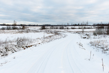 country snowy road in winter