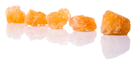 Sugarcane rock over white background 