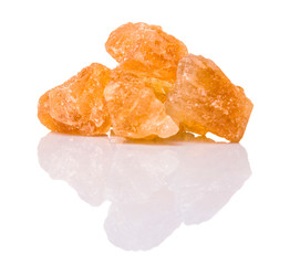 Sugarcane rock over white background 