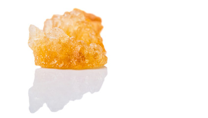 Sugarcane rock over white background