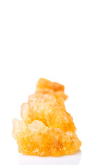 Sugarcane rock over white background