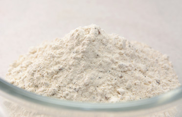 Close-up of bread flour mix in a glass bowl