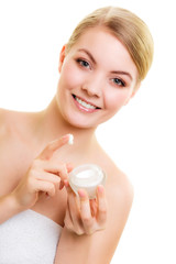 Obraz na płótnie Canvas Skin care. Girl applying moisturizing cream