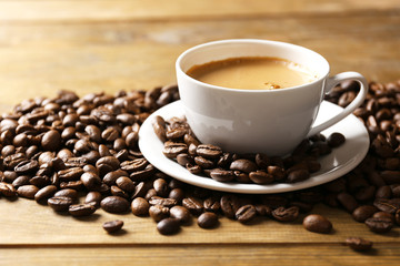 Cup of coffee on wooden table
