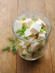 Feta cheese on table