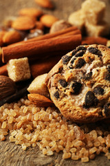 Christmas spices and baking ingredients on wooden background