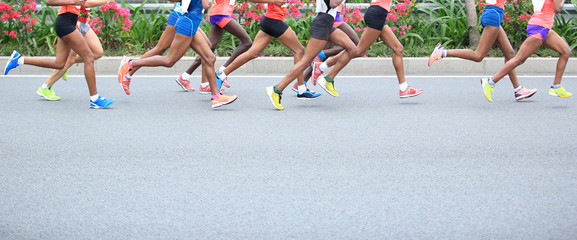 Marathon running race, people feet on city road  - obrazy, fototapety, plakaty