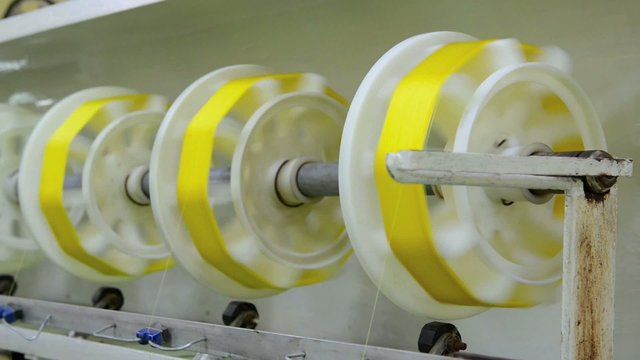 Silkworm cocoon on silk mill. Silk-reeling establishment