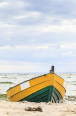Wooden boat on The Baltic shore.
