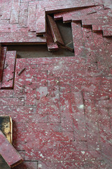 wooden parquet floor red damaged