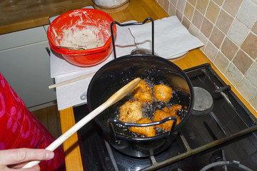 Baking traditional Dutch Doughnuts for New Year