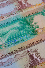 Different Dirham  banknotes from Emirates on the table