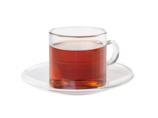 Tea in glass cup on a background. Tea in glass cup on a backgrou