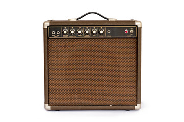 Brown electric guitar amplifier isolated on white background - Powered by Adobe
