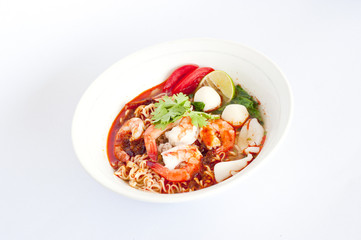 Sour prawn soup(Tom yum khoong) with noodles isolated