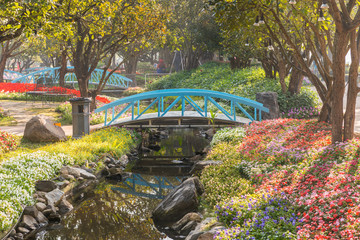 Blue wooden bridge in the garden