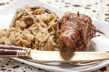 Beef roulade with cabbage.