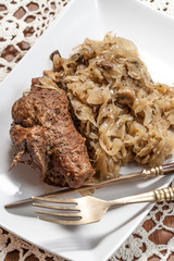 Beef roulade with cabbage.