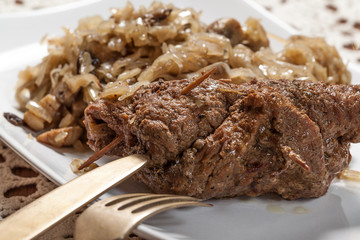 Beef roulade with cabbage.