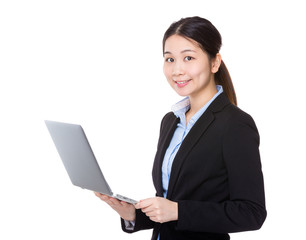 Businesswoman use of portable computer