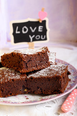 Chocolate brownies dusted with icing sugar