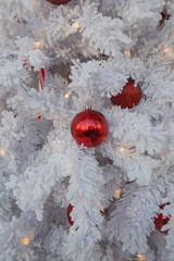 White Christmas tree with red balls