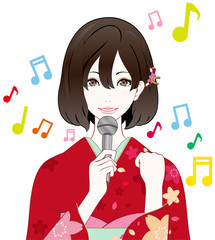 着物の女性　歌う