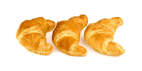 Three butter croissant isolated on white background