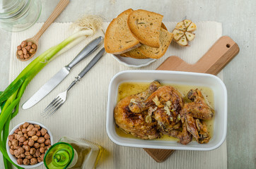 Roasted chicken parts with bio garlic, herb-garlic toast