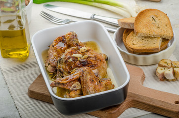 Roasted chicken parts with bio garlic, herb-garlic toast