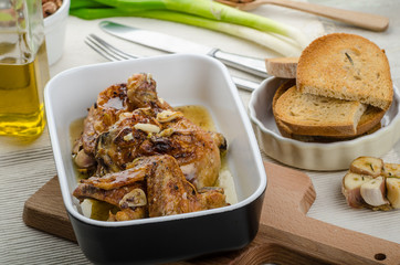 Roasted chicken parts with bio garlic, herb-garlic toast