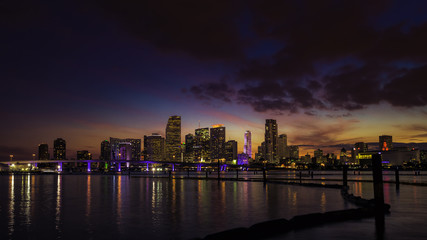 Fototapeta na wymiar Miami city skyline at dusk with urban skyscrapers