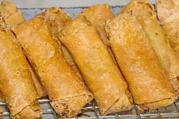 Fried spring rolls many in market Thailand.