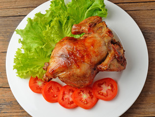 Roasted chicken seasoned with herbs