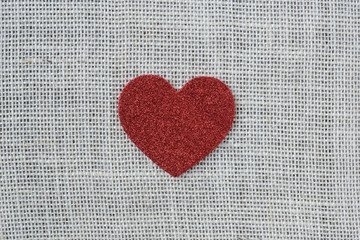 Red Heart on Burlap Background