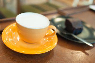 Coffee cup and brownie