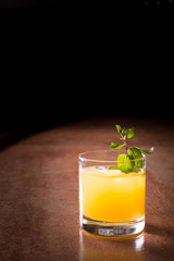 Screw driver cocktail with fresh mint