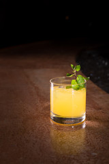 Screw driver cocktail with fresh mint