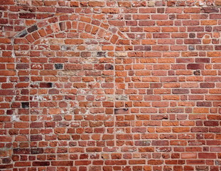 Blind secret hidden entrance in old red brickwall