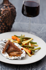 Cooked duck fillet served with vegetables