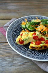 Tasty fritatta with cucumbers and carrots