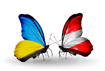 Two butterflies with flags Ukraine and Austria