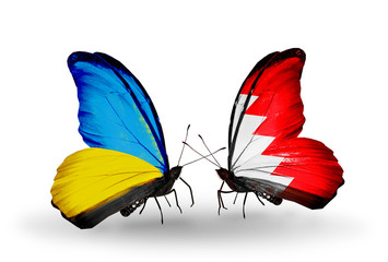 Two butterflies with flags Ukraine and Bahrain