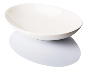 Empty white oval salad bowl over white background 