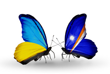 Two butterflies with flags  Ukraine and Marshall islands