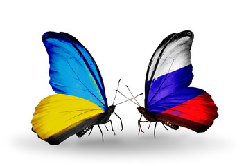 Two butterflies with flags Ukraine and Russia