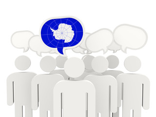 People with flag of antarctica